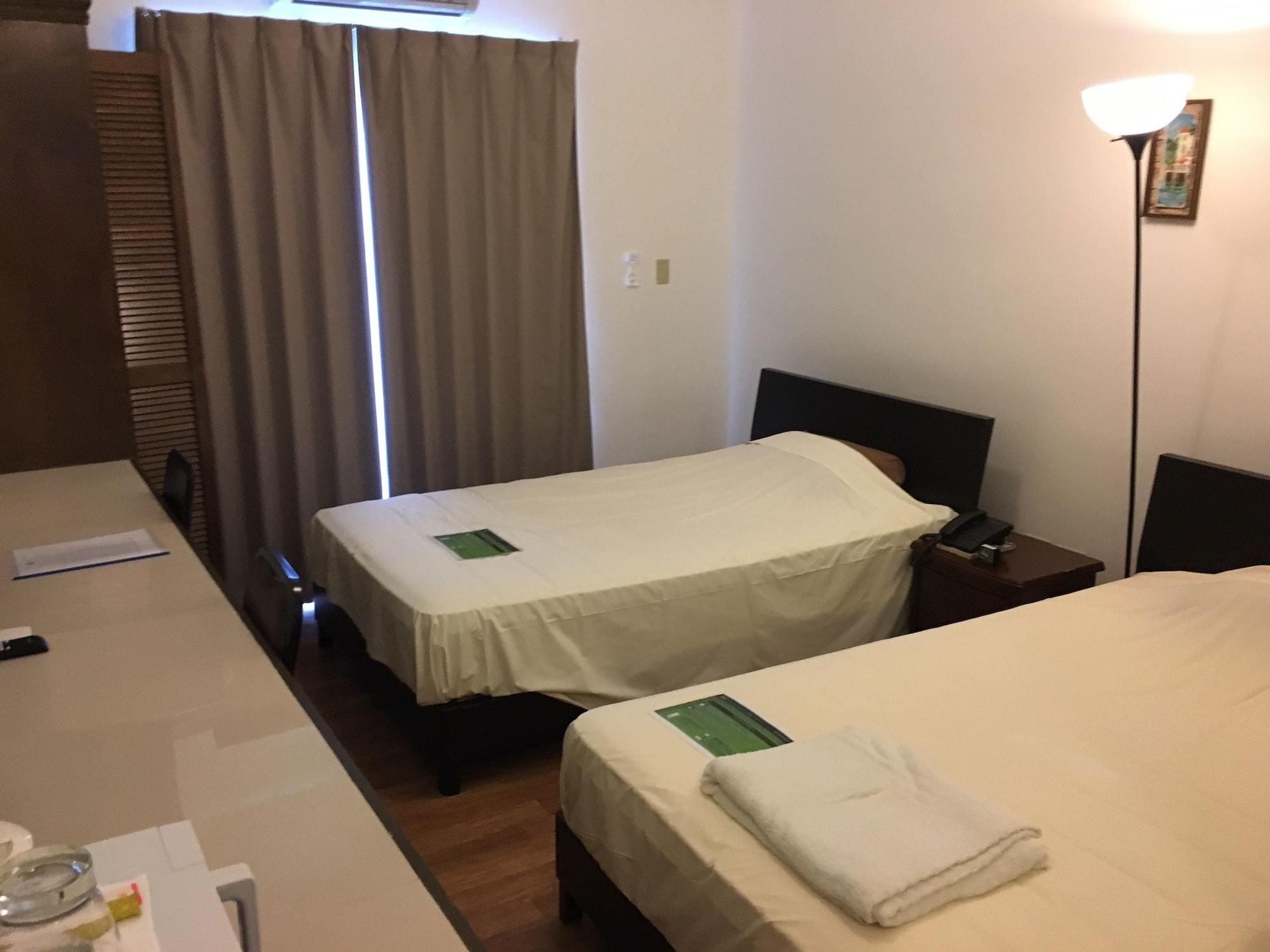 Himawari Hotel Garapan Exteriör bild