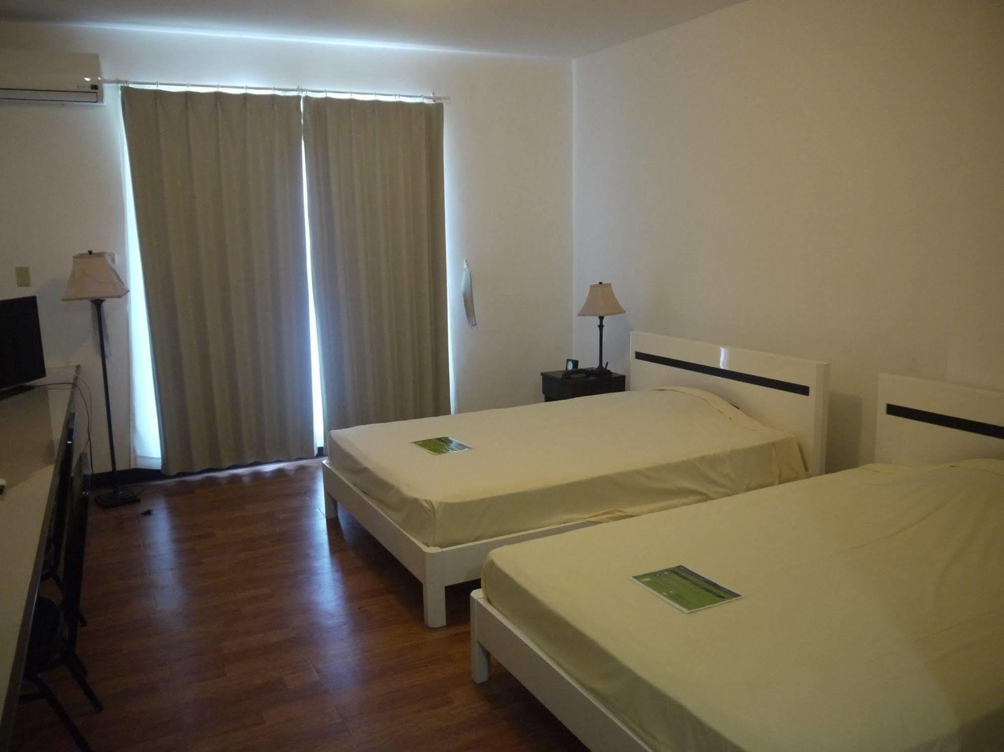 Himawari Hotel Garapan Exteriör bild